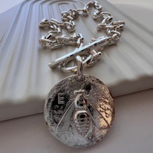 Cadena moneda griega